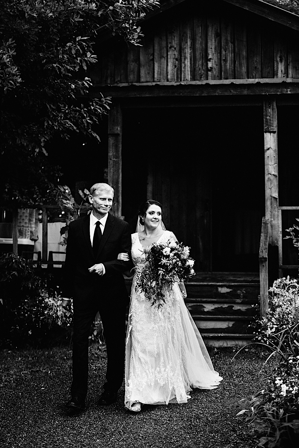 bride and her dad walk down aisle 