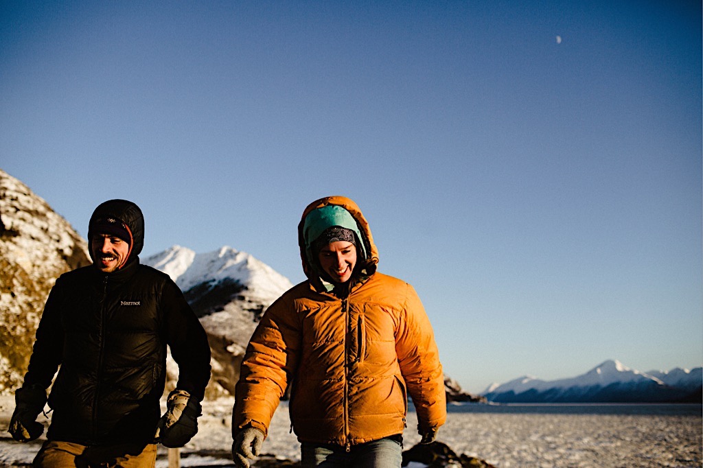 couple in winter outdoor gear at beluga point 