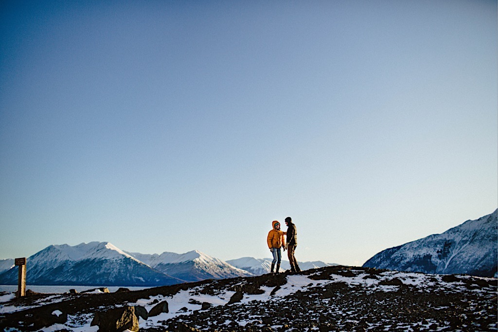 blue skies and mountains with couple