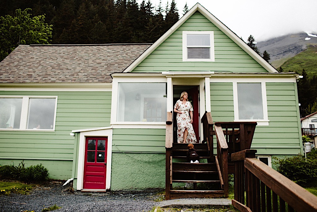 mother of groom on porch of house in seward alaska 