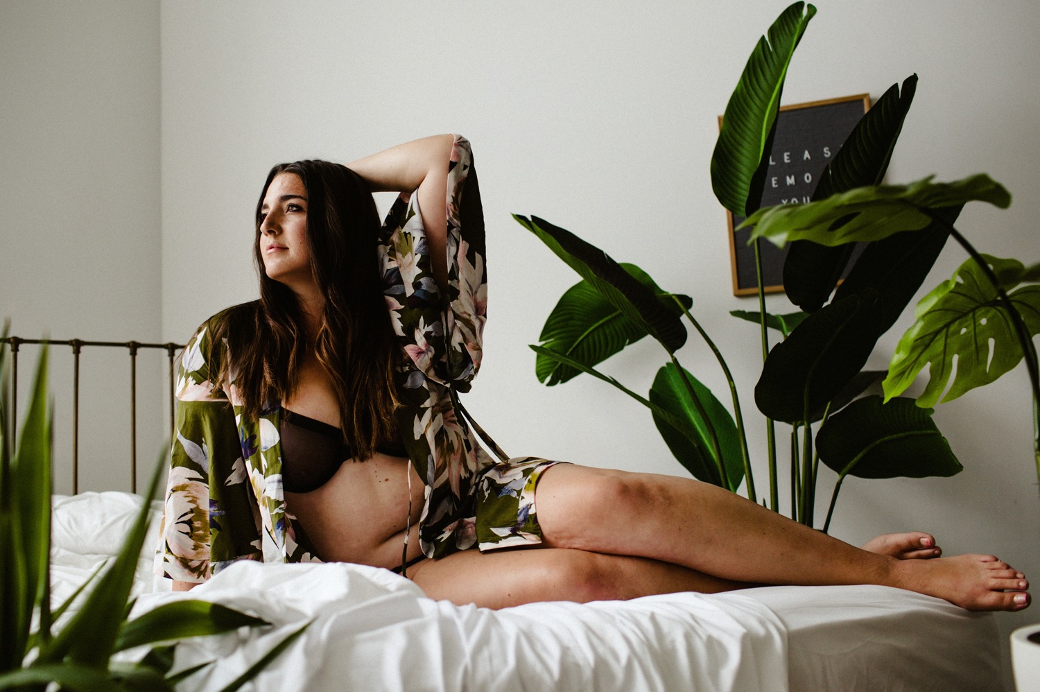 women lounging on bed boudoir photoshoot