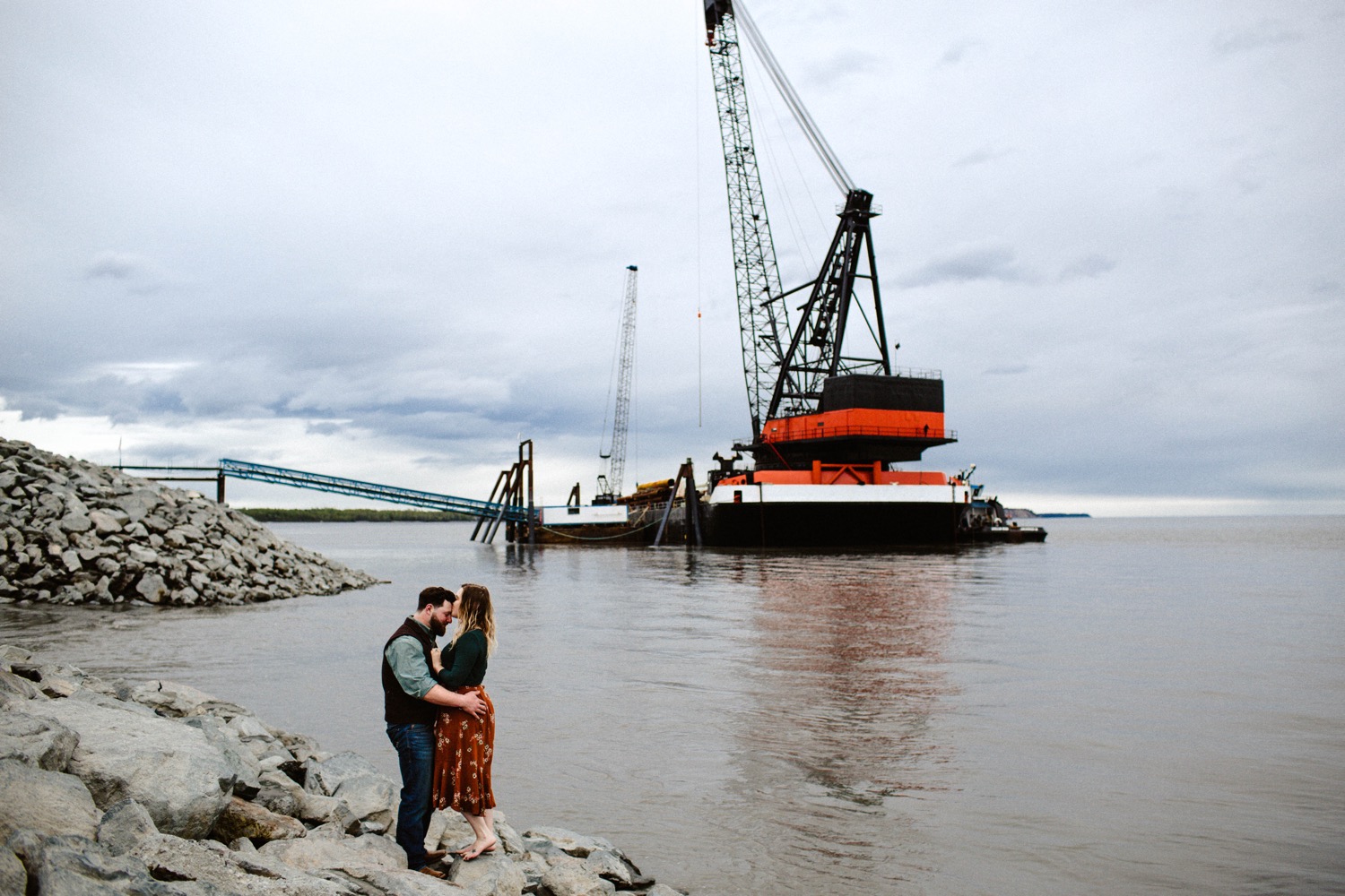 alaska couple with barge at port of anchorage