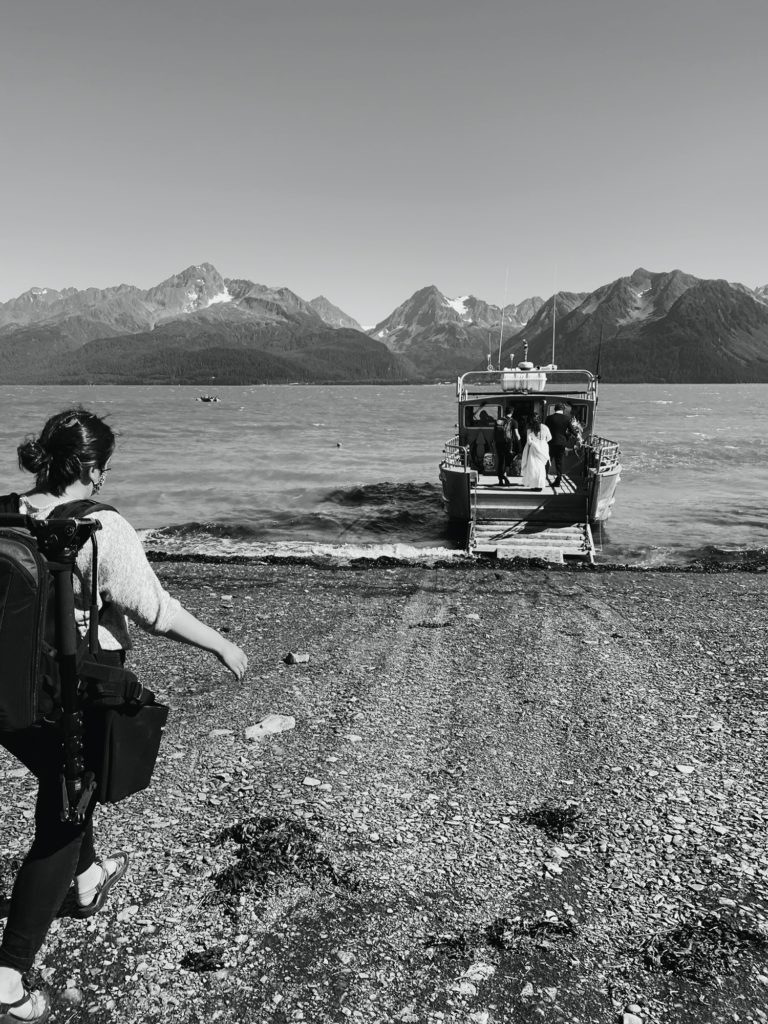 lauren roberts boards a water taxi in seward alaska