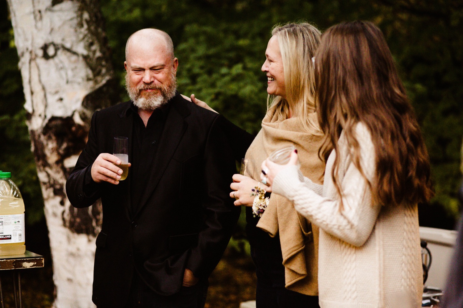 father of bride gets emotional during toast at backyard wedding in anchorage