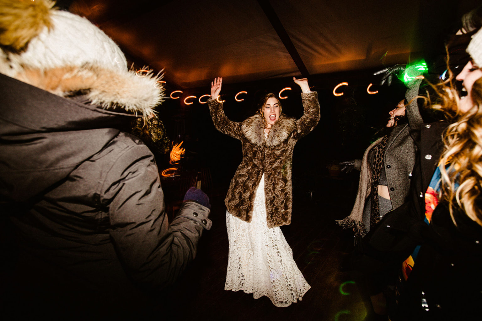 bride dancing at raven glacier lodge wedding reception