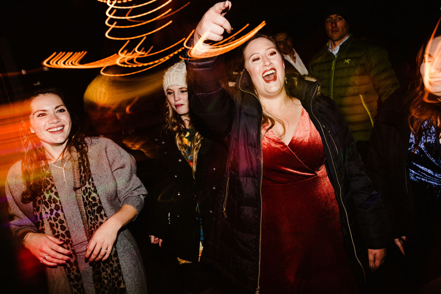 crowd dancing at raven glacier lodge wedding reception