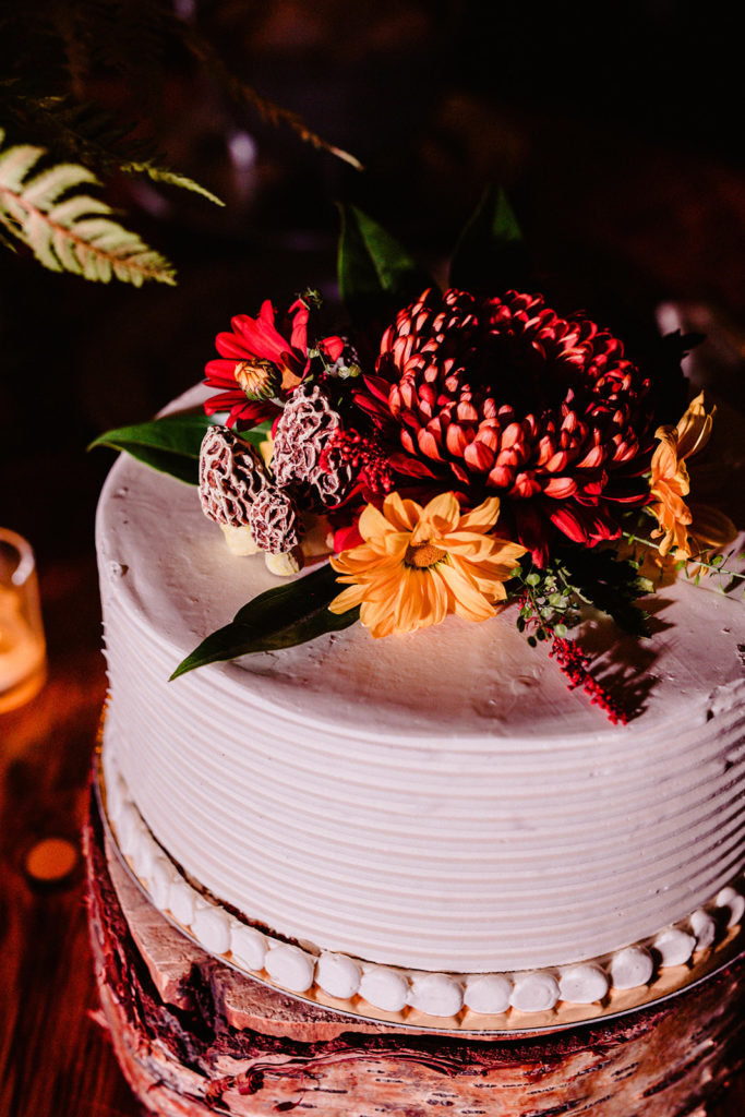 forest themed wedding cake with ceramic morel mushrooms