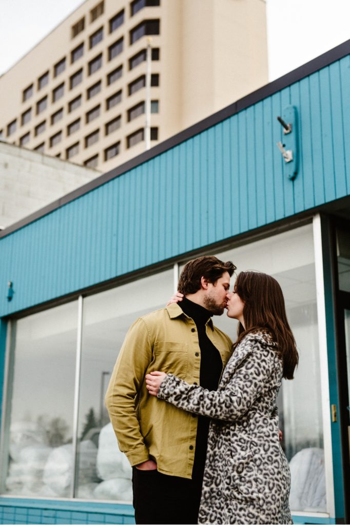 couple kissing in downtown anchorage